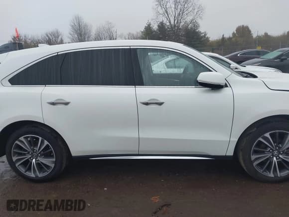 ✅ 2019 Acura MDX Technology • VIN: 5J8YD4H76KL015699 • Lot: 43734631. Listed on IAAI with 103,439 mi. Free auction sales archive from the USA and detailed vehicle history report at DreamBid. Image 13.