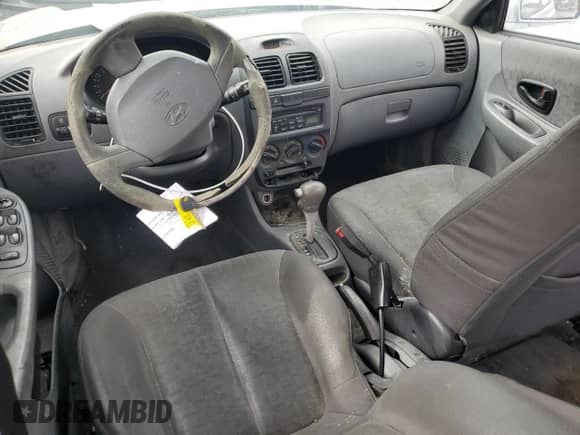 2004 Hyundai Accent GL с VIN KMHCG45C34U567915, выставлен на аукционе Copart как лот 43654985 с пробегом 141 461 миль миль и Чистый • Clean title. История ставок и продаж доступна на DreamBid. Изображение 8.