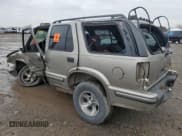 ✅ 1999 Chevrolet Blazer Trailblazer • VIN: 1GNCS13W8X2122902 • Lot: 85032064. Wystawiony na Copart z przebiegiem Nie podano. Bezpłatny archiwum sprzedaży aukcyjnych z USA i szczegółowy raport historii pojazdu na DreamBid. Zdjęcie 2.