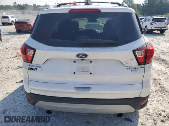 ✅ 2019 Ford Escape Titanium • VIN: 1FMCU0J92KUA87647 • Lot: 63764995. Wystawiony na Copart z przebiegiem 95 682 mil. Bezpłatny archiwum sprzedaży aukcyjnych z USA i szczegółowy raport historii pojazdu na DreamBid. Zdjęcie 6.
