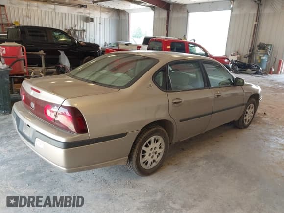 ✅ 2002 Chevrolet Impala • VIN: 2G1WF52E129198958 • Lot: 42919041. Wystawiony na IAAI z przebiegiem 70 687 mil. Bezpłatny archiwum sprzedaży aukcyjnych z USA i szczegółowy raport historii pojazdu na DreamBid. Zdjęcie 4.