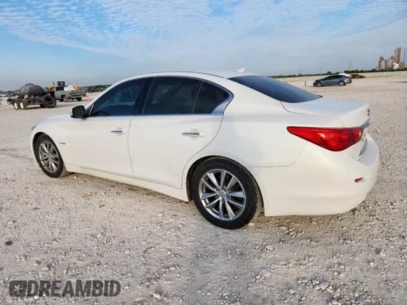 ✅ 2014 Infiniti Q50 Hybrid Premium • VIN: JN1AV7AP0EM691026 • Лот: 86131475. Опубликован ранее на Copart с пробегом 105 992 миль. Бесплатный доступ к архиву аукционных продаж из США и подробный отчёт об истории автомобиля на DreamBid. Изображение 2.