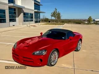 ✅ 2004 Dodge Viper SRT-10 • VIN: 1B3JZ65Z74V100319 • Lot: 94958805. Listed on Copart with 54,469 mi. Free auction sales archive from the USA and detailed vehicle history report at DreamBid. Image 2.