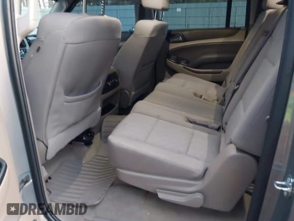 ✅ 2017 Chevrolet Suburban LS • VIN: 1GNSCGKC0HR328355 • Lot: 41039618. Listed on IAAI with 76,028 mi. Free auction sales archive from the USA and detailed vehicle history report at DreamBid. Image 8.