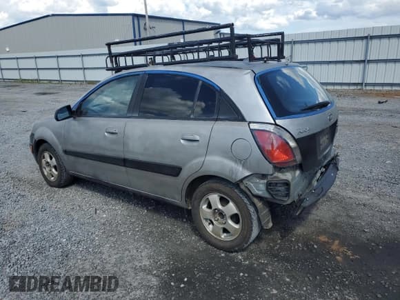 ✅ 2008 Kia Rio SX • VIN: KNADE163586393784 • Lot: 56575405. Listed on Copart with 124,452 mi. Free auction sales archive from the USA and detailed vehicle history report at DreamBid. Image 2.