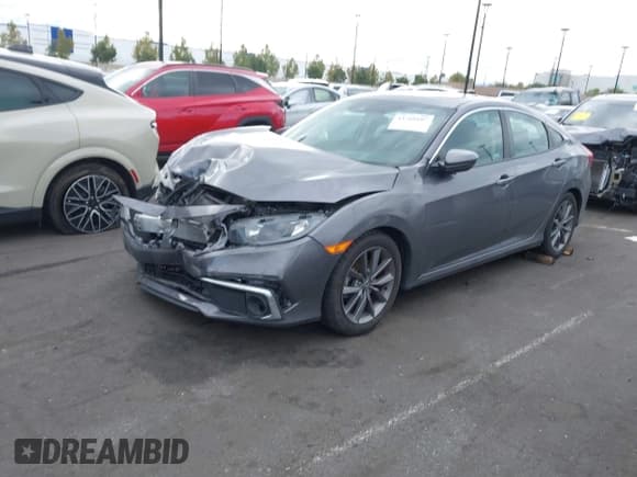 ✅ 2019 Honda Civic EX • VIN: 19XFC1F34KE208482 • Lot: 43760107. Listed on IAAI with 71,283 mi. Free auction sales archive from the USA and detailed vehicle history report at DreamBid. Image 17.