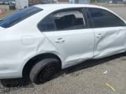 ✅ 2014 Volkswagen Jetta SE • VIN: 3VWD17AJ1EM314028 • Lot: 42591957. Listed on IAAI with 123,424 mi. Free auction sales archive from the USA and detailed vehicle history report at DreamBid. Image 16.