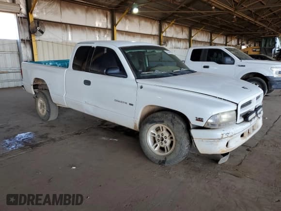 ✅ 1998 Dodge Dakota SLT • VIN: 1B7GL22X1WS652280 • Lot: 50545805. Wystawiony na Copart z przebiegiem Nie podano. Bezpłatny archiwum sprzedaży aukcyjnych z USA i szczegółowy raport historii pojazdu na DreamBid. Zdjęcie 4.