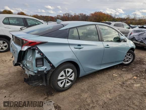 2018 Toyota Prius Two z VIN JTDKBRFU7J3058785, wystawiony jako Copart lot #90085795 z przebiegiem 83 292 mil mil oraz Szkoda całkowita • Salvage title. Historia ofert i sprzedaży dostępna na DreamBid. Obrazek 3.