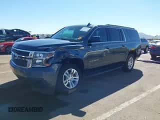 2019 Chevrolet Suburban LS z VIN 1GNSCGKC4KR244725, wystawiony jako IAAI lot #43452942 z przebiegiem 65 997 mil mil oraz . Historia ofert i sprzedaży dostępna na DreamBid. Obrazek 2.