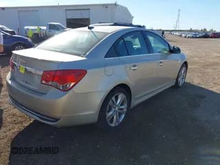 ✅ 2013 Chevrolet Cruze LTZ • VIN: 1G1PG5SB1D7120028 • Lot: 43409983. Listed on IAAI with 232,025 mi. Free auction sales archive from the USA and detailed vehicle history report at DreamBid. Image 4.