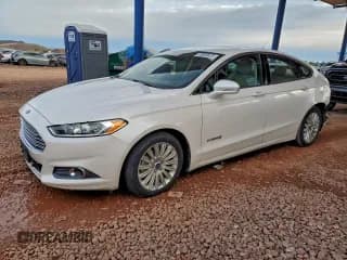 ✅ 2013 Ford Fusion SE Hybrid • VIN: 3FA6P0LUXDR144929 • Lot: 93900425. Listed on Copart with Not provided. Free auction sales archive from the USA and detailed vehicle history report at DreamBid. Image 1.