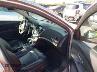 2011 Chevrolet Cruze LTZ z VIN 1G1PH5S9XB7236951, wystawiony jako IAAI lot #43354259 z przebiegiem 109 992 mil mil oraz . Historia ofert i sprzedaży dostępna na DreamBid. Obrazek 5.