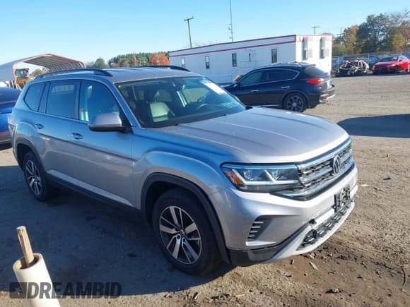 ✅ 2022 Volkswagen Atlas SE • VIN: 1V2LP2CAXNC502818 • Lot: 43509736. Listed on IAAI with 64,911 mi. Free auction sales archive from the USA and detailed vehicle history report at DreamBid. Image 1.