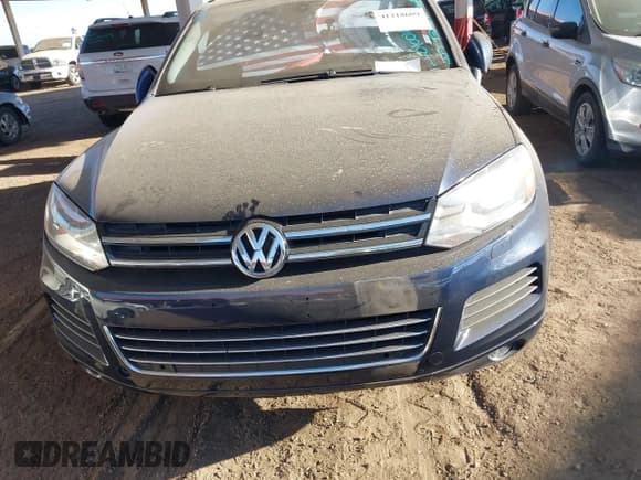 ✅ 2014 Volkswagen Touareg Sport • VIN: WVGEF9BPXED010016 • Lot: 41218609. Wystawiony na IAAI z przebiegiem 135 118 mil. Bezpłatny archiwum sprzedaży aukcyjnych z USA i szczegółowy raport historii pojazdu na DreamBid. Zdjęcie 6.