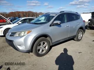 ✅ 2013 Toyota RAV4 XLE • VIN: 2T3RFREV2DW006818 • Lot: 92790415. Listed on Copart with 96,920 mi. Free auction sales archive from the USA and detailed vehicle history report at DreamBid. Image 1.