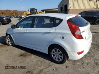✅ 2014 Hyundai Accent GS • VIN: KMHCT5AE1EU154305 • Лот: 77044364. Опубликован ранее на Copart с пробегом 156 123 миль. Бесплатный доступ к архиву аукционных продаж из США и подробный отчёт об истории автомобиля на DreamBid. Изображение 2.