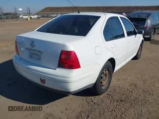 ✅ 2002 Volkswagen Jetta GLS • VIN: 3VWSB69M92M192494 • Lot: 43594883. Listed on IAAI with 215,379 mi. Free auction sales archive from the USA and detailed vehicle history report at DreamBid. Image 4.