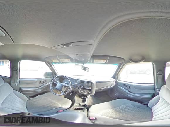 2002 Chevrolet Blazer LS z VIN 1GNDT13W42K241542, wystawiony jako Copart lot #77425714 z przebiegiem 171 055 mil mil oraz Szkoda całkowita • Salvage title. Historia ofert i sprzedaży dostępna na DreamBid. Obrazek 13.