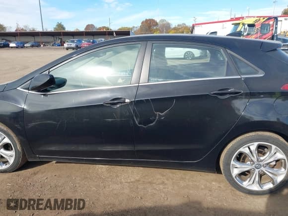 ✅ 2013 Hyundai Elantra • VIN: KMHD35LE7DU124225 • Lot: 43590670. Listed on IAAI with 98,658 mi. Free auction sales archive from the USA and detailed vehicle history report at DreamBid. Image 14.