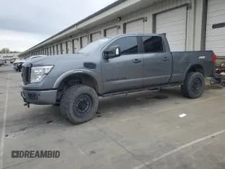 ✅ 2017 Nissan Titan Pro-4X • VIN: 1N6BA1F44HN558449 • Lot: 90286965. Wystawiony na Copart z przebiegiem 120 666 mil. Bezpłatny archiwum sprzedaży aukcyjnych z USA i szczegółowy raport historii pojazdu na DreamBid. Zdjęcie 1.