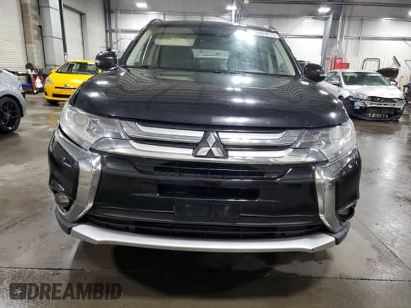 2016 Mitsubishi Outlander SE с VIN JA4AZ3A33GZ057264, выставлен на аукционе Copart как лот 69369875 с пробегом 162 081 миль миль и Списание • Salvage title. История ставок и продаж доступна на DreamBid. Изображение 5.