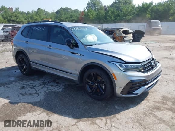 ✅ 2023 Volkswagen Tiguan SE R-Line Black • VIN: 3VVCB7AX2PM055070 • Лот: 42787459. Опубликован ранее на IAAI с пробегом 88 798 миль. Бесплатный доступ к архиву аукционных продаж из США и подробный отчёт об истории автомобиля на DreamBid. Изображение 1.