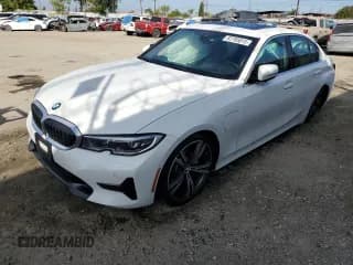 ✅ 2021 BMW 3 Series 330e • VIN: 3MW5P7J0XM8B71405 • Lot: 82705015. Listed on Copart with 40,772 mi. Free auction sales archive from the USA and detailed vehicle history report at DreamBid. Image 1.