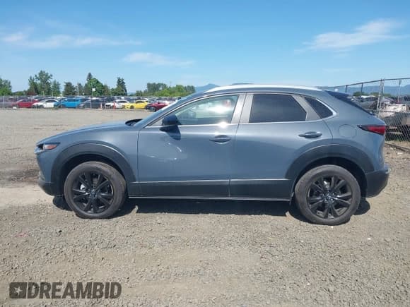 ✅ 2022 Mazda CX-30 S Carbon Edition • VIN: 3MVDMBCL8NM422737 • Lot: 42229336. Listed on IAAI with 14,665 mi. Free auction sales archive from the USA and detailed vehicle history report at DreamBid. Image 14.