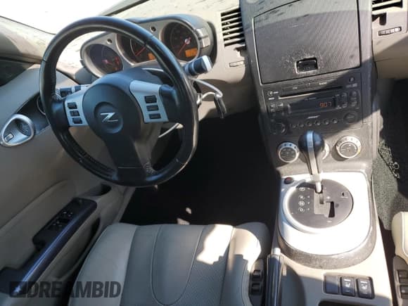 ✅ 2007 Nissan 350Z Touring • VIN: JN1BZ36A07M652297 • Lot: 69073074. Wystawiony na Copart z przebiegiem 112 136 mil. Bezpłatny archiwum sprzedaży aukcyjnych z USA i szczegółowy raport historii pojazdu na DreamBid. Zdjęcie 8.