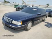 ✅ 1997 Cadillac DeVille • VIN: 1G6KD54Y2VU264494 • Lot: 67474365. Listed on Copart with 142,504 mi. Free auction sales archive from the USA and detailed vehicle history report at DreamBid. Image 1.