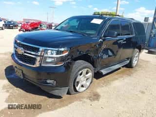 2019 Chevrolet Suburban LT z VIN 1GNSCHKC1KR396161, wystawiony jako IAAI lot #43051943 z przebiegiem 147 521 mil mil oraz . Historia ofert i sprzedaży dostępna na DreamBid. Obrazek 2.