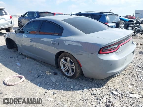 ✅ 2021 Dodge Charger SXT • VIN: 2C3CDXBG1MH518225 • Lot: 43371767. Wystawiony na IAAI z przebiegiem 113 984 mil. Bezpłatny archiwum sprzedaży aukcyjnych z USA i szczegółowy raport historii pojazdu na DreamBid. Zdjęcie 3.
