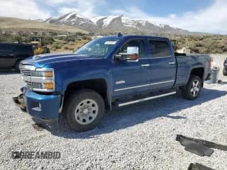 ✅ 2017 Chevrolet Silverado 2500HD High Country • VIN: 1GC1KXEY2HF242433 • Лот: 52452835. Опубликован ранее на Copart с пробегом 138 301 миль. Бесплатный доступ к архиву аукционных продаж из США и подробный отчёт об истории автомобиля на DreamBid. Изображение 1.