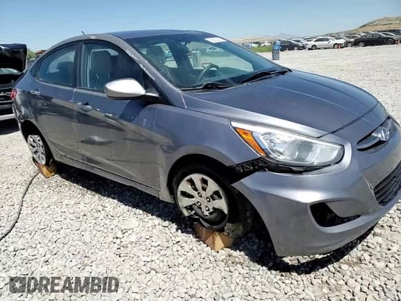 2005 Hyundai Accent GLS z VIN KMHCT4AEXFU929213, wystawiony jako Copart lot #60053935 z przebiegiem 152 892 mil mil oraz Szkoda całkowita • Salvage title. Historia ofert i sprzedaży dostępna na DreamBid. Obrazek 13.