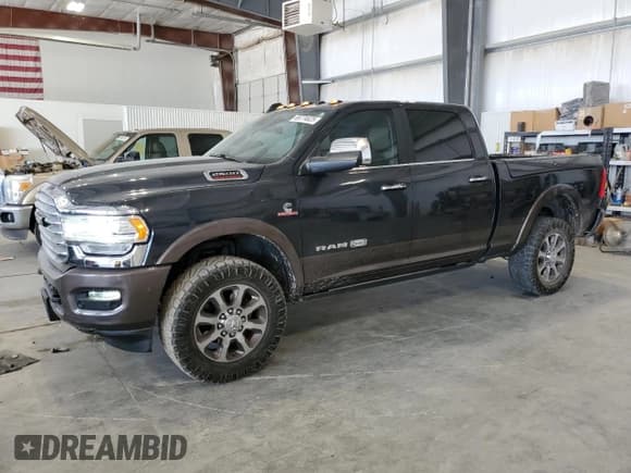 ✅ 2020 Ram 2500 Longhorn • VIN: 3C6UR5GL8LG283453 • Лот: 69774625. Опубликован ранее на Copart с пробегом 47 739 миль. Бесплатный доступ к архиву аукционных продаж из США и подробный отчёт об истории автомобиля на DreamBid. Изображение 1.