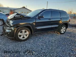 ✅ 2011 Jeep Grand Cherokee Laredo • VIN: 1J4RR4GTXBC586643 • Lot: 91539235. Listed on Copart with 96,548 mi. Free auction sales archive from the USA and detailed vehicle history report at DreamBid. Image 1.
