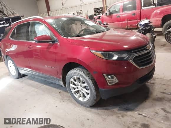 2018 Chevrolet Equinox LT z VIN 2GNAXSEVXJ6112062, wystawiony jako IAAI lot #43406177 z przebiegiem 69 608 mil mil oraz . Historia ofert i sprzedaży dostępna na DreamBid. Obrazek 1.