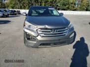 ✅ 2015 Hyundai Santa Fe • VIN: 5XYZWDLA0FG251461 • Lot: 90425665. Listed on Copart with 131,044 mi. Free auction sales archive from the USA and detailed vehicle history report at DreamBid. Image 14.