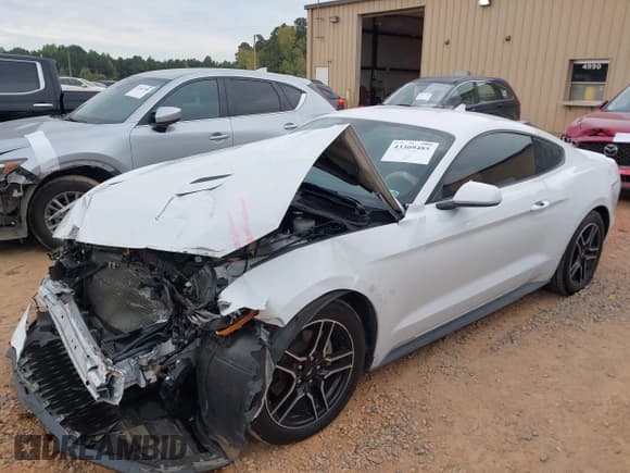 ✅ 2021 Ford Mustang EcoBoost • VIN: 1FA6P8TH9M5101140 • Lot: 43309485. Listed on IAAI with 69,861 mi. Free auction sales archive from the USA and detailed vehicle history report at DreamBid. Image 17.