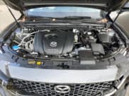 ✅ 2023 Mazda CX-50 S Premium Plus • VIN: 7MMVABEM6PN108775 • Lot: 89535515. Wystawiony na Copart z przebiegiem 29 714 mil. Bezpłatny archiwum sprzedaży aukcyjnych z USA i szczegółowy raport historii pojazdu na DreamBid. Zdjęcie 12.