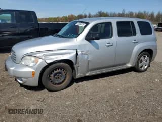 ✅ 2010 Chevrolet HHR LS • VIN: 3GNBAADB5AS588292 • Lot: 52305825. Listed on Copart with 153,988 mi. Free auction sales archive from the USA and detailed vehicle history report at DreamBid. Image 1.