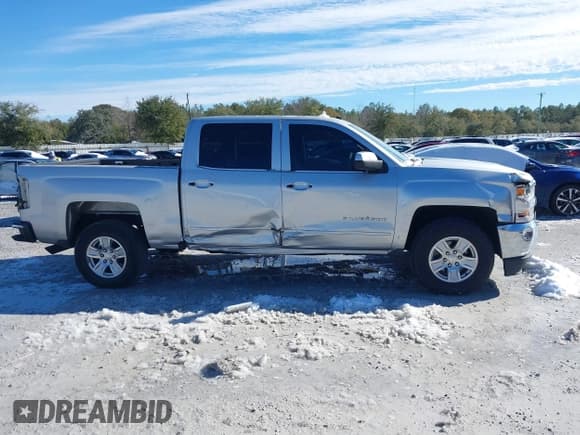 ✅ 2018 Chevrolet Silverado 1500 LT • VIN: 3GCPCREH6JG359777 • Лот: 41377806. Опубликован ранее на IAAI с пробегом 133 611 миль. Бесплатный доступ к архиву аукционных продаж из США и подробный отчёт об истории автомобиля на DreamBid. Изображение 14.