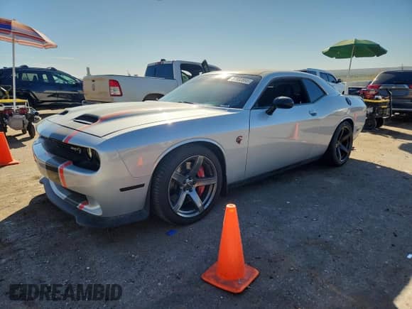 2019 Dodge Challenger SRT Hellcat с VIN 2C3CDZC99KH759457, выставлен на аукционе Copart как лот 87033995 с пробегом 33 883 миль миль и Списание • Salvage title. История ставок и продаж доступна на DreamBid. Изображение 1.