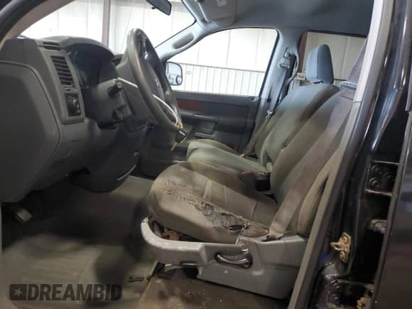 2006 Dodge 1500 Laramie z VIN 1D7HU18216S646119, wystawiony jako Copart lot #69236755 z przebiegiem 276 183 mil mil oraz Szkoda całkowita • Salvage title. Historia ofert i sprzedaży dostępna na DreamBid. Obrazek 7.