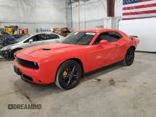 ✅ 2021 Dodge Challenger SXT • VIN: 2C3CDZGG7MH611075 • Lot: 67646035. Wystawiony na Copart z przebiegiem 31 413 mil. Bezpłatny archiwum sprzedaży aukcyjnych z USA i szczegółowy raport historii pojazdu na DreamBid. Zdjęcie 1.