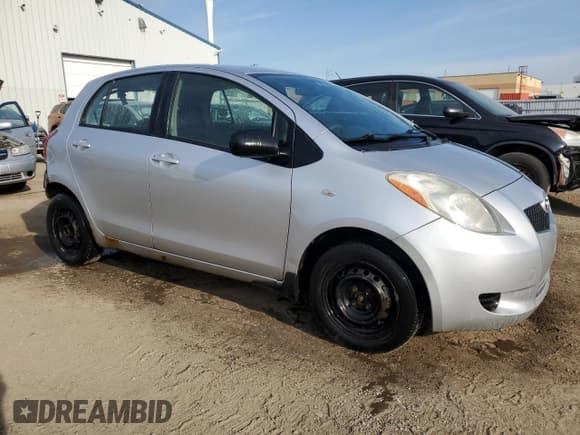 ✅ 2007 Toyota Yaris LE • VIN: JTDKT923975130495 • Lot: 53696475. Listed on Copart with 336,460 mi. Free auction sales archive from the USA and detailed vehicle history report at DreamBid. Image 4.