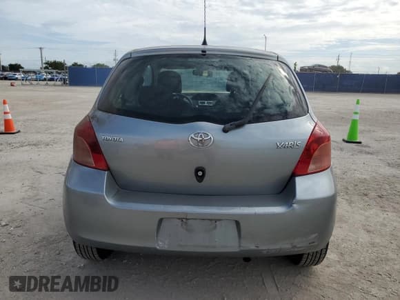 ✅ 2007 Toyota Yaris • VIN: JTDJT903275052785 • Lot: 90978005. Listed on Copart with 128,798 mi. Free auction sales archive from the USA and detailed vehicle history report at DreamBid. Image 6.