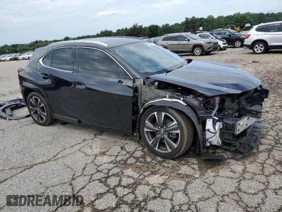✅ 2023 Lexus UX 250h Premium • VIN: JTHP6JBH8P2133821 • Lot: 61007355. Listed on Copart with 32,540 mi. Free auction sales archive from the USA and detailed vehicle history report at DreamBid. Image 4.
