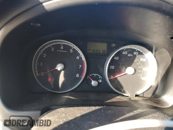 2010 Hyundai Accent SE z VIN KMHCN3AC9AU181792, wystawiony jako Copart lot #88247215 z przebiegiem 155 578 mil mil oraz Czysty tytuł • Clean title. Historia ofert i sprzedaży dostępna na DreamBid. Obrazek 9.